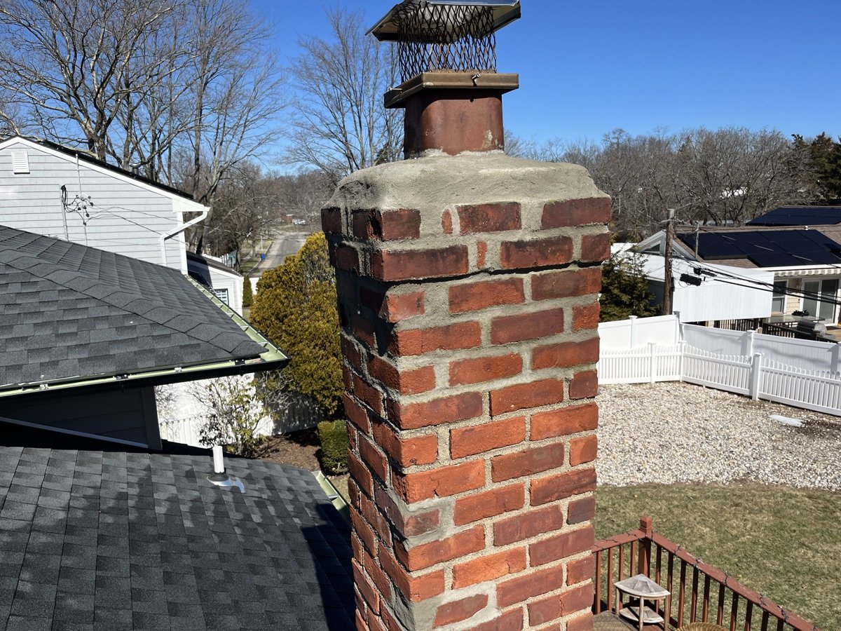 Finished chimney restoration by Capstone Chimney